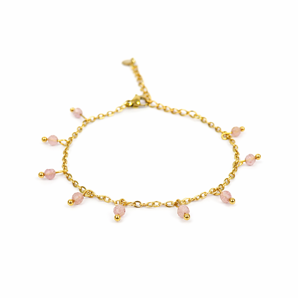 Armband van goldplated stainless steel met facetgeslepen aardbeienkwarts