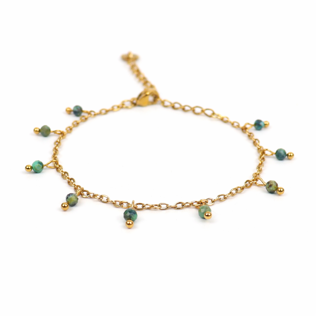 Armband van goldplated stainless steel met facetgeslepen afrikaanse turkoois
