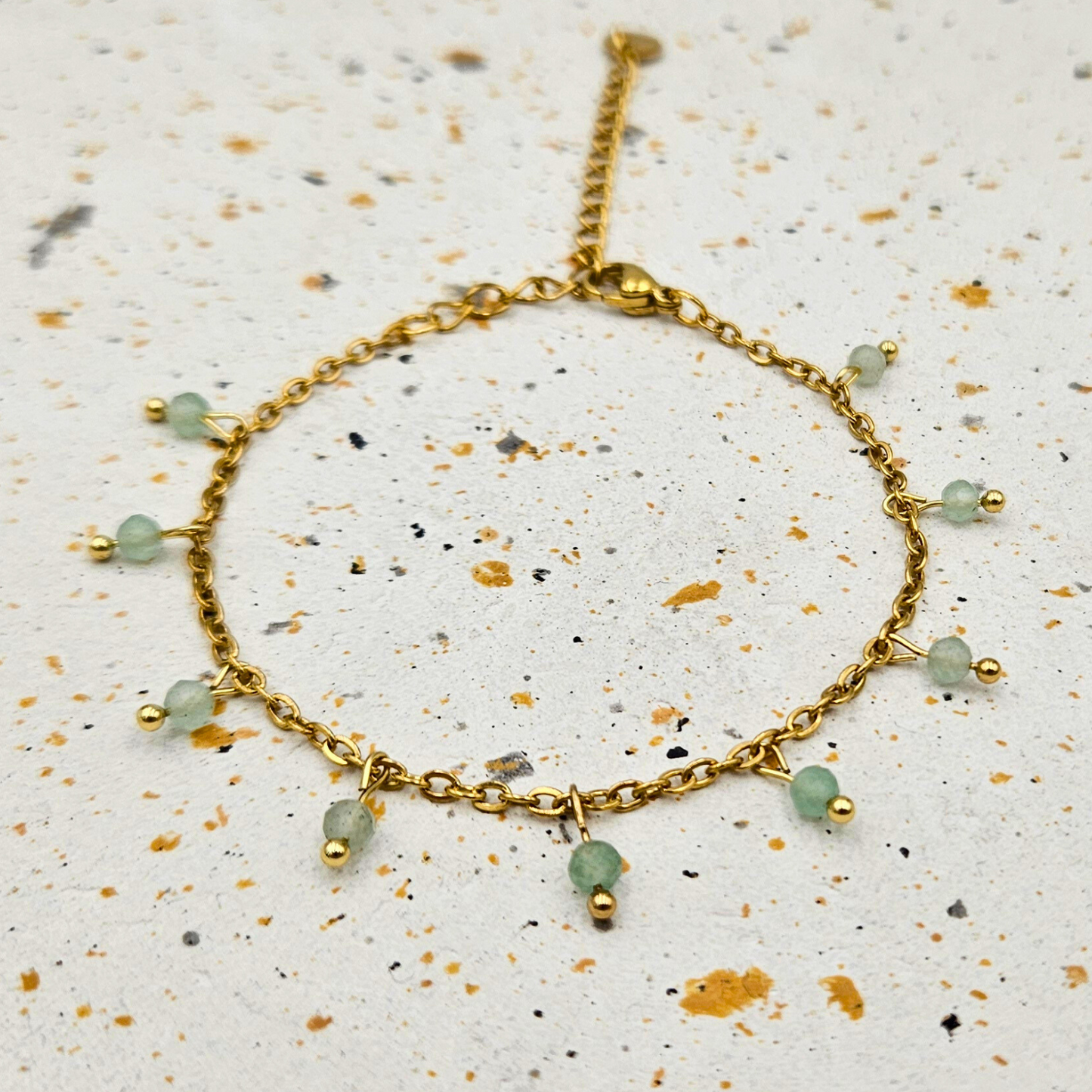 Armband van goldplated stainless steel met facetgeslepen aventurijn