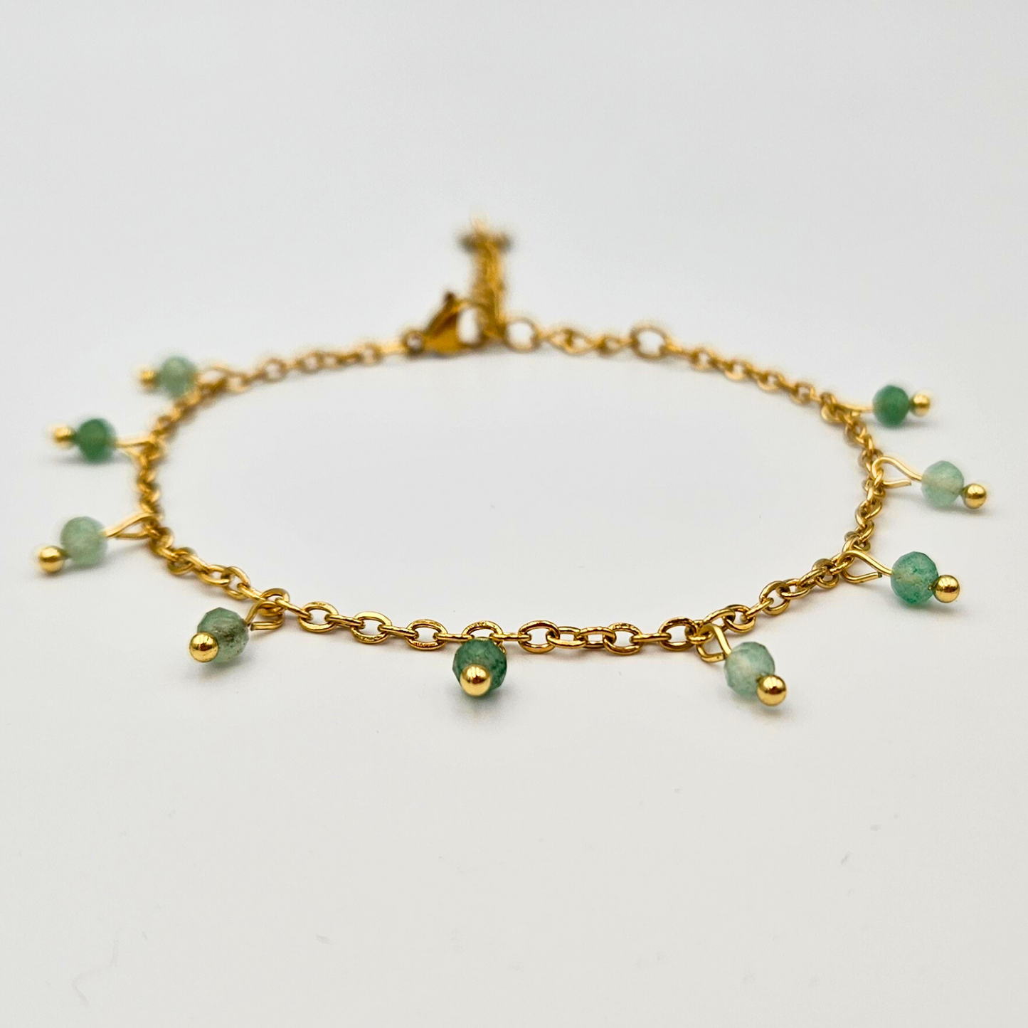 Armband van goldplated stainless steel met facetgeslepen aventurijn