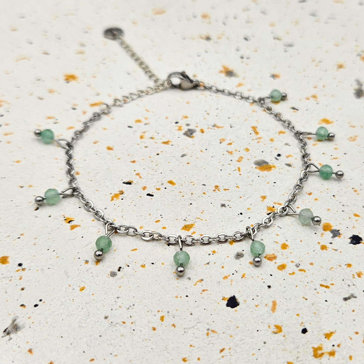 Armband gemaakt van stainless steel met facetgeslepen aventurijn edelsteentjes