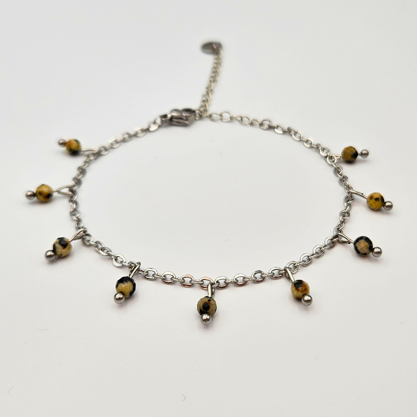 Armband gemaakt van stainless steel met facetgeslepen dalmatiër jaspis edelsteentjes