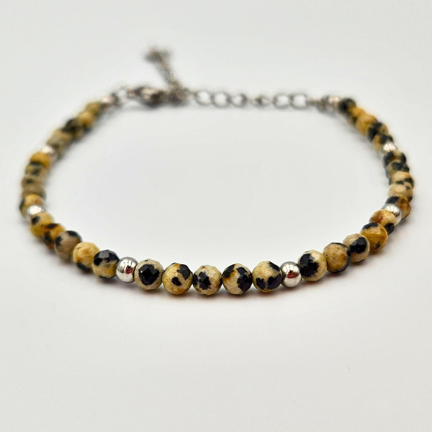 Armband gemaakt van stainless steel met facetgeslepen dalmatiër jaspis