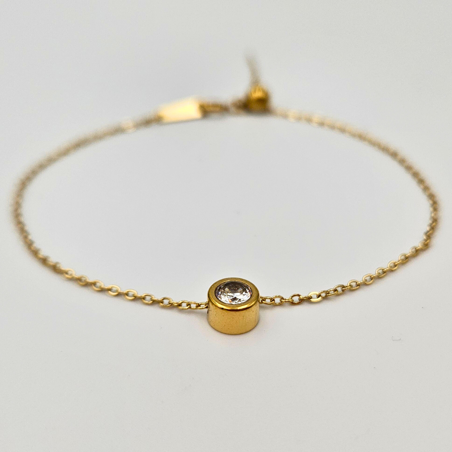 Armband van goldplated stainless steel met geboortesteen van april: diamant