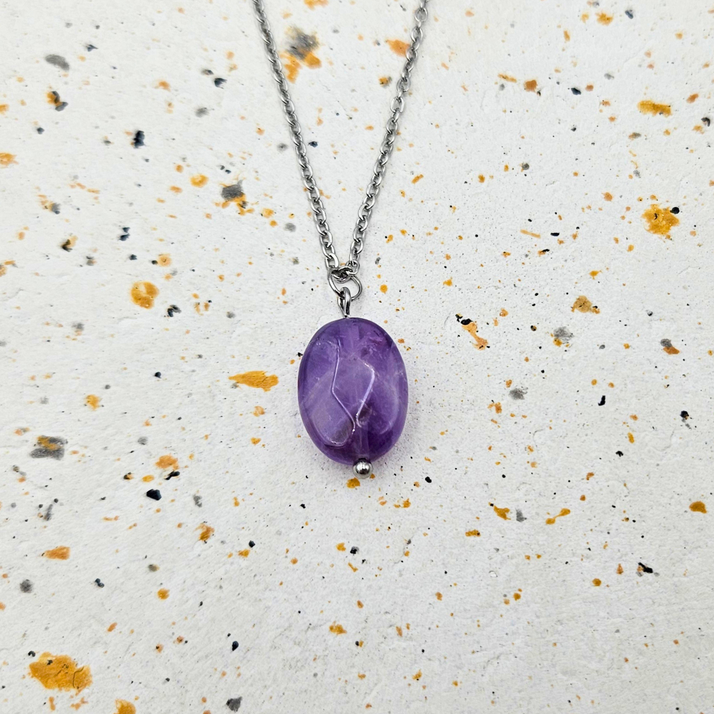 Ketting gemaakt van stainless steel met amethist hanger