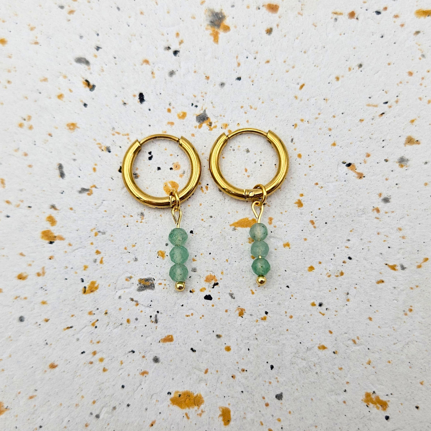 Oorbellen van goldplated stainless steel met facetgeslepen aventurijn