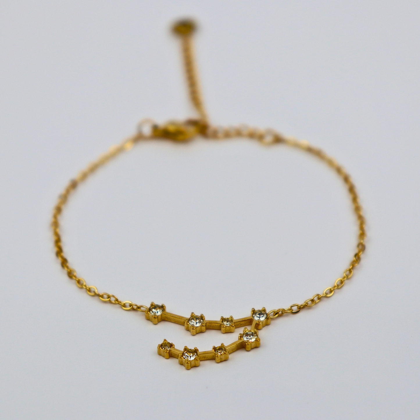 Sterrenbeeld armband steenbok goud