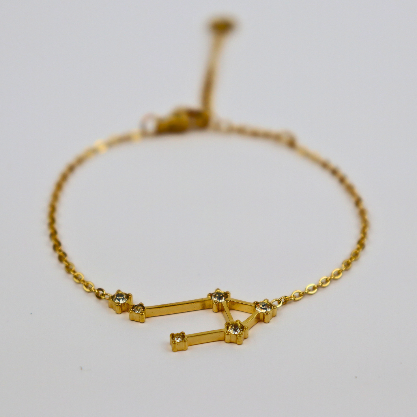 Sterrenbeeld armband weegschaal goud