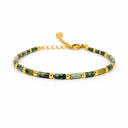 Armband van goldplated stainless steel en tubevormige afrikaanse turkoois kralen