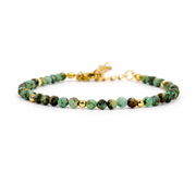 Armband van goldplated stainless steel met facetgeslepen afrikaanse turkoois