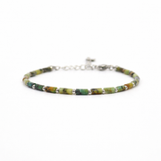 Armband gemaakt van stainless steel en tubevormige afrikaanse turkoois kralen