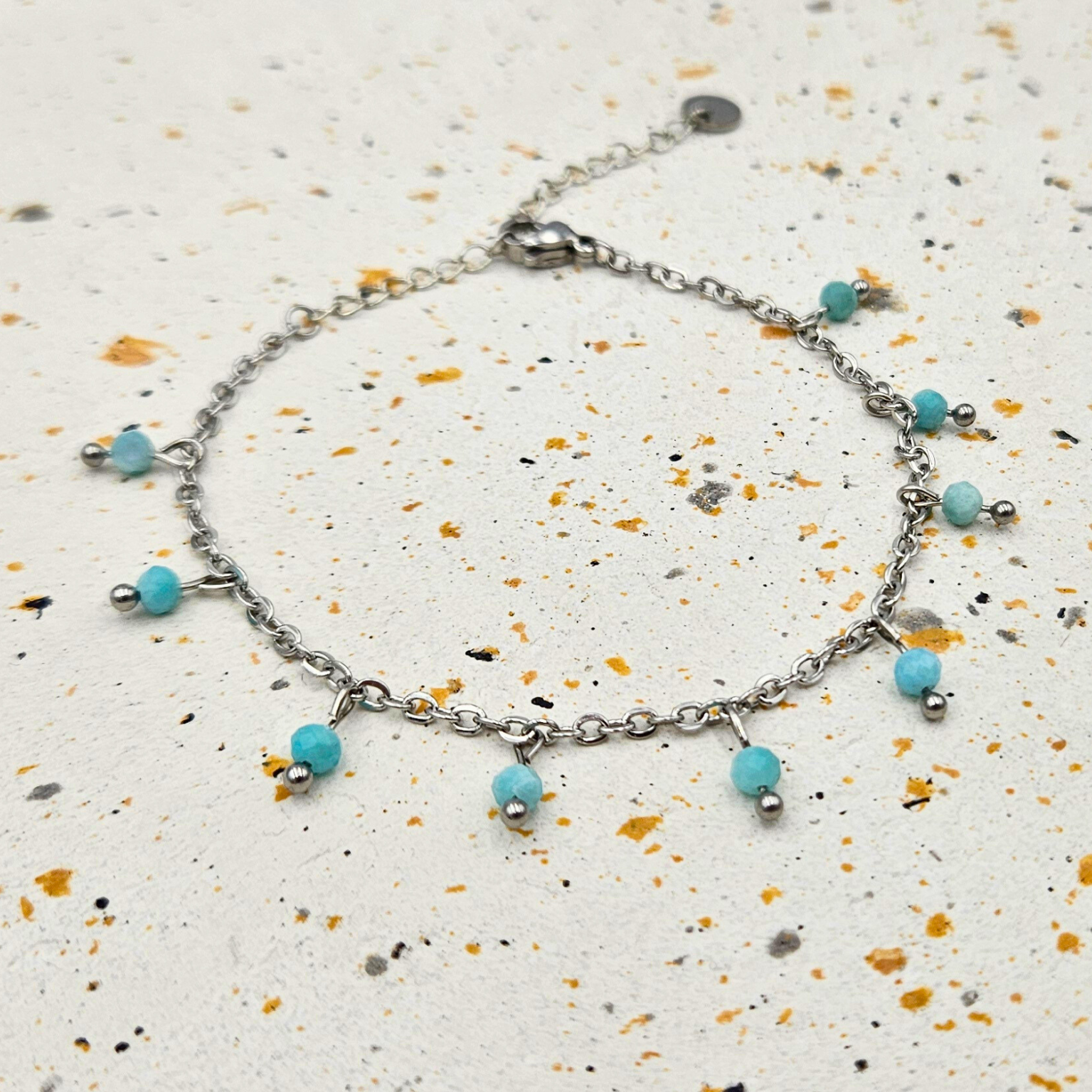 Armband gemaakt van stainless steel met facetgeslepen amazoniet edelsteentjes