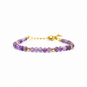 Armband van facetgeslepen amethist afgewerkt met goldplated stainless steel