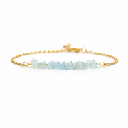 Armband van goldplated stainless steel met aquamarijn split