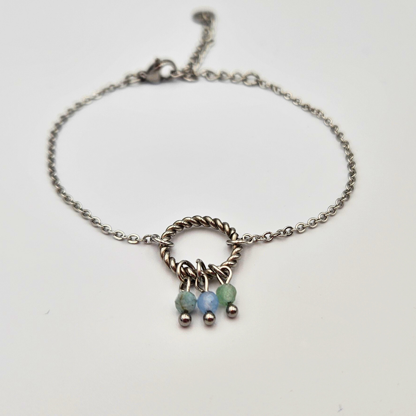 Armband gemaakt van stainless steel met facetgeslepen aventurijn, aquamarijn en amazoniet