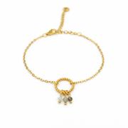 Armband van goldplated stainless steel met facetgeslepen opaliet, labradoriet en rookkwarts
