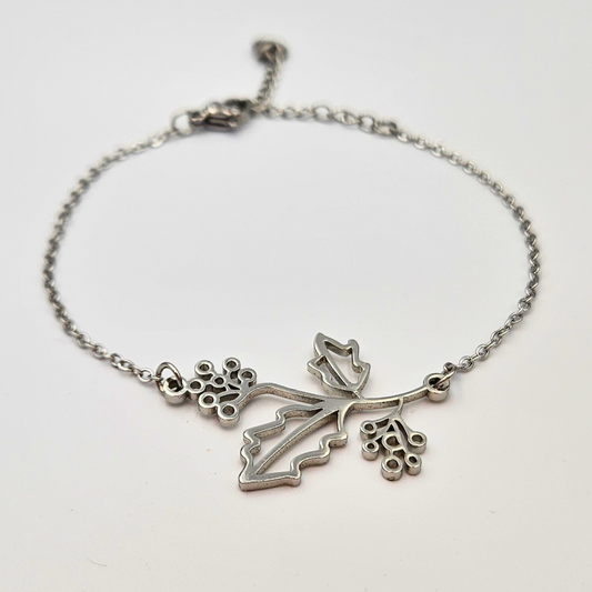 Armband gemaakt van stainless steel met geboortebloem van december: de hulst