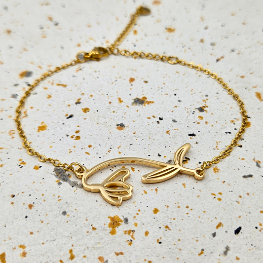Armband van goldplated stainless steel met geboortebloem van januari: het sneeuwklokje