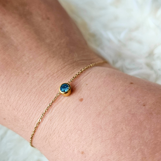 Armband van goldplated stainless steel met geboortesteen van december: topaas