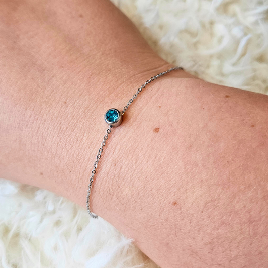 Armband gemaakt van stainless steel met geboortesteen van december: topaas