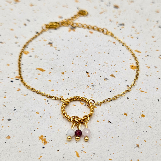 Armband van goldplated stainless steel met facetgeslepen maansteen, granaat en rozenkwarts