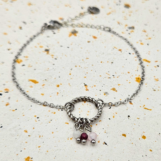 Armband gemaakt van stainless steel met facetgeslepen maansteen, granaat en rozenkwarts