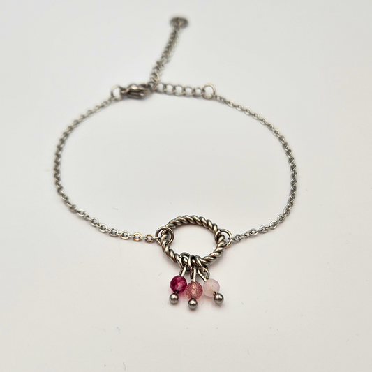 Armband gemaakt van stainless steel met facetgeslepen toermalijn, aardbeienkwarts en rozenkwarts