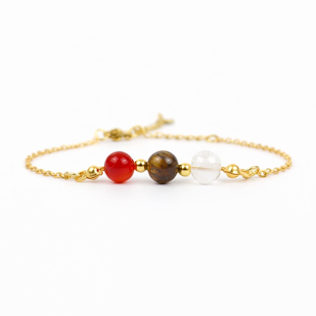 Armband van goldplated stainless steel met de 3 edelstenen die passen bij sterrenbeeld leeuw: carneool, tijgeroog en bergkristal