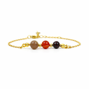 Armband gemaakt van goldplated stainless steel met de 3 edelstenen die passen bij sterrenbeeld ram: carneool, granaat en agaat