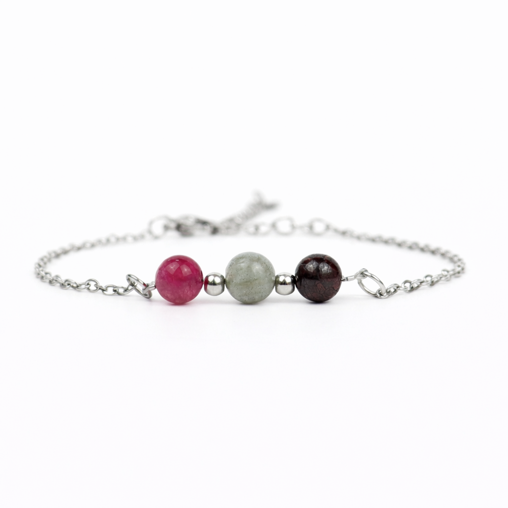 Armband van stainless steel met de 3 edelstenen die passen bij het sterrenbeeld schorpioen: toermalijn, labradoriet en granaat