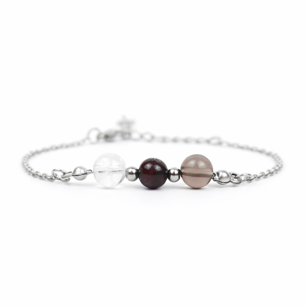 Armband van stainless steel met de 3 edelstenen die passen bij het sterrenbeeld steenbok: bergkristal, granaat en rookkwarts