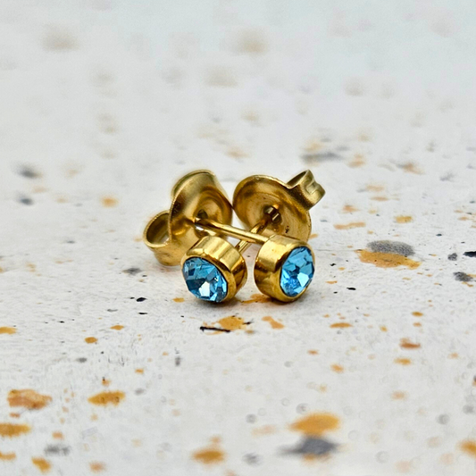 Oorbellen van goldplated stainless steel met geboortesteen van december: topaas