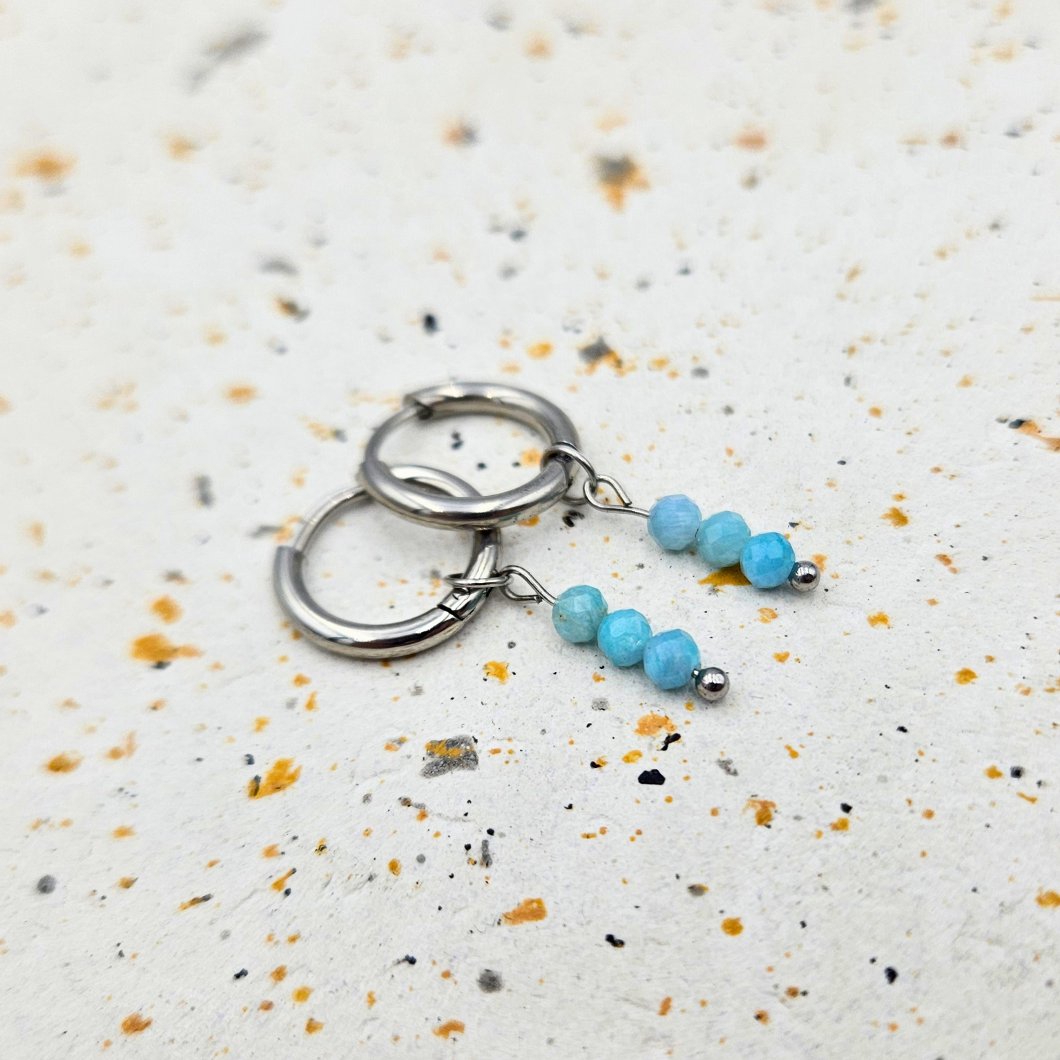 Oorbellen gemaakt van stainless steel met facetgeslepen amazoniet