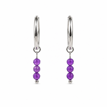 Oorbellen gemaakt van stainless steel met kleine hanger van facetgeslepen amethist