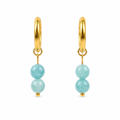 Oorbellen van goldplated stainless steel met ronde aquamarijn kralen