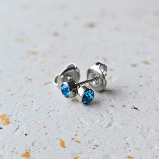 Oorbellen gemaakt van stainless steel met geboortesteen van december: topaas