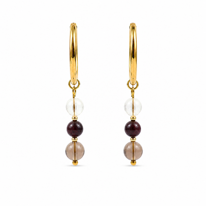 Oorbellen van goldplated stainless steel met de 3 edelstenen die passen bij het sterrenbeeld steenbok: bergkristal, granaat en rookkwarts