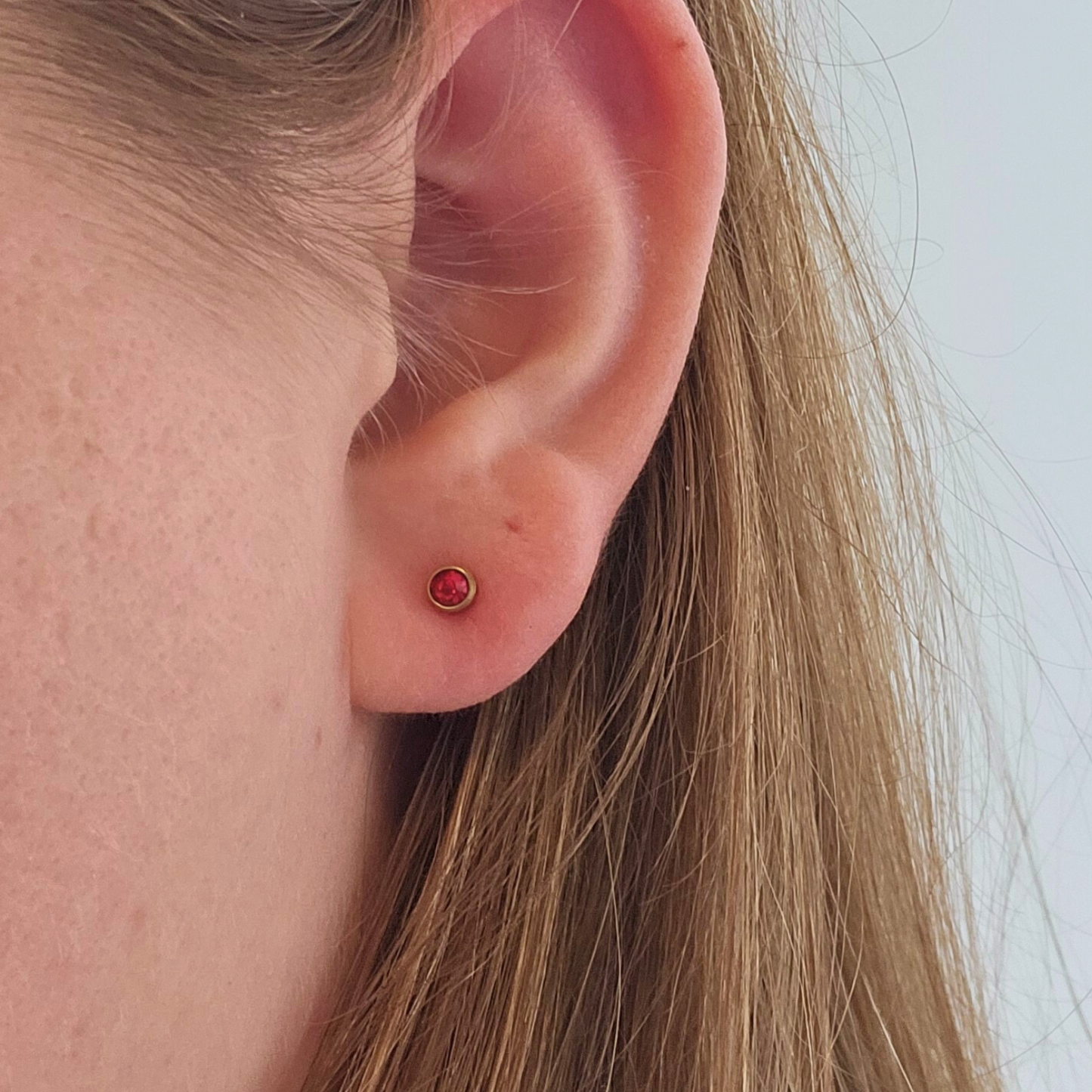 Oorbellen geboortesteen januari goud