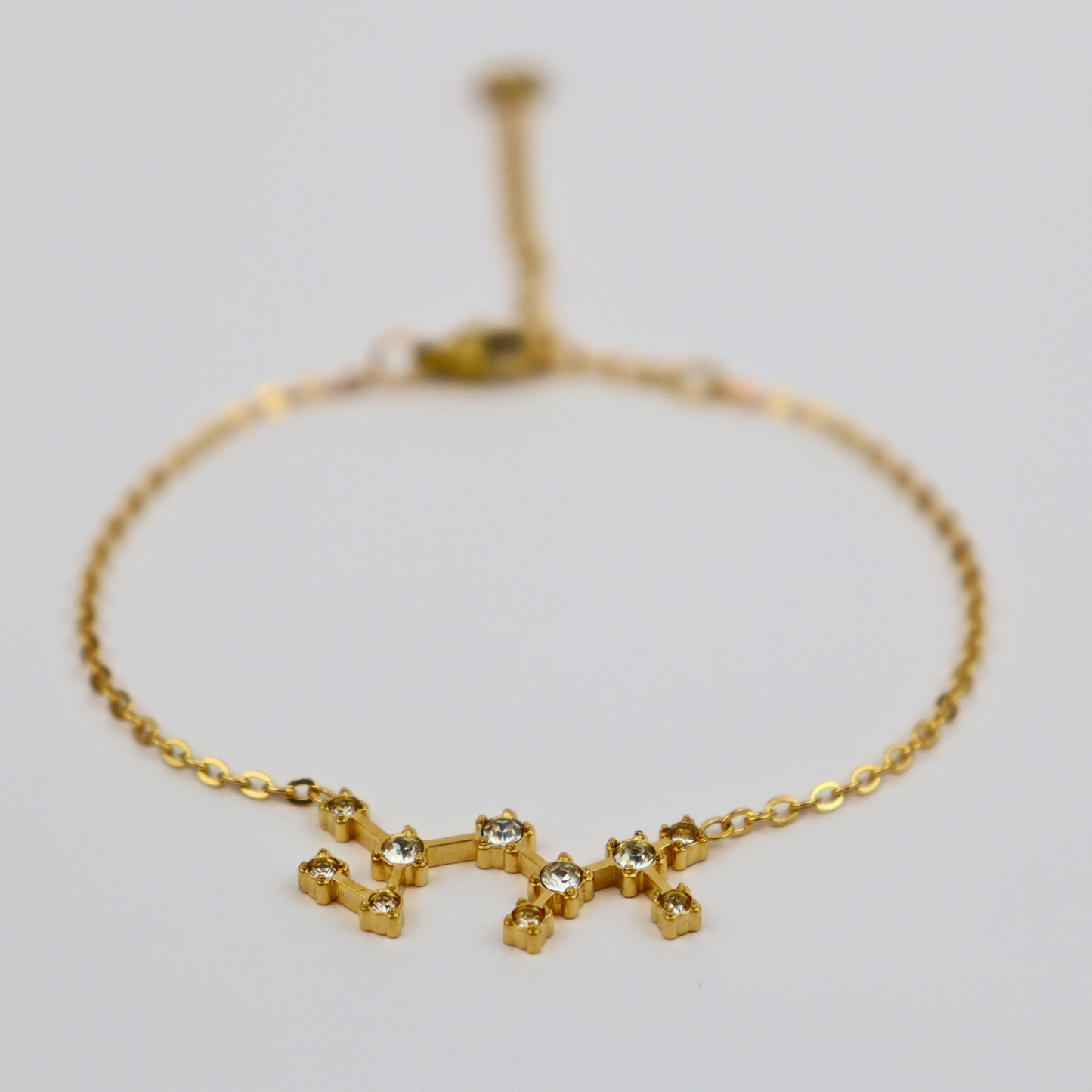 Sterrenbeeld armband boogschutter goud