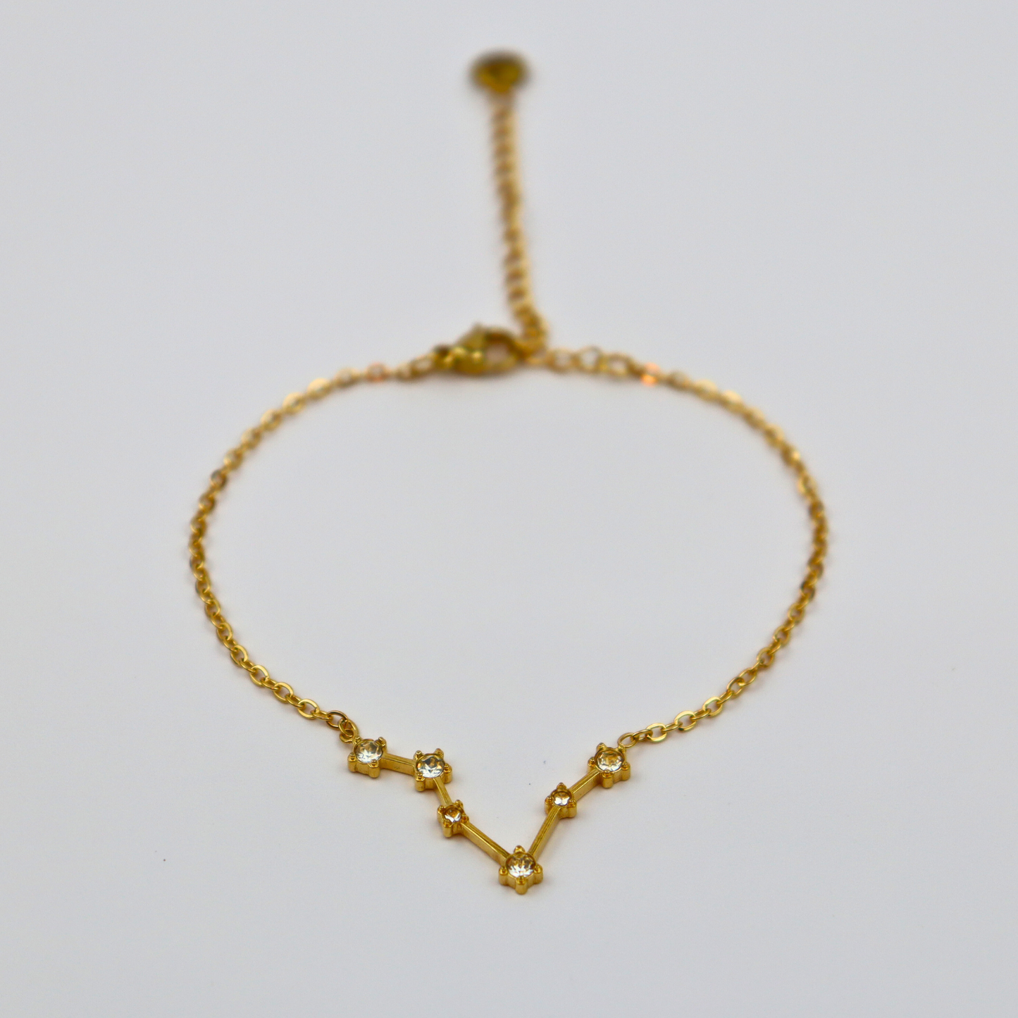 Sterrenbeeld armband vissen goud