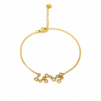 Armband van goldplated stainless steel met zirkonia steentjes in de vorm van het sterrenbeeld schorpioen