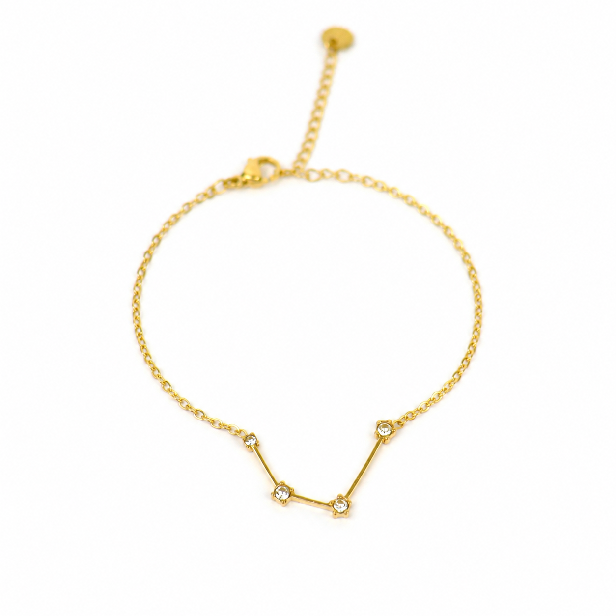 Armband van goldplated stainless steel met zirkonia steentjes in de vorm van het sterrenbeeld waterman