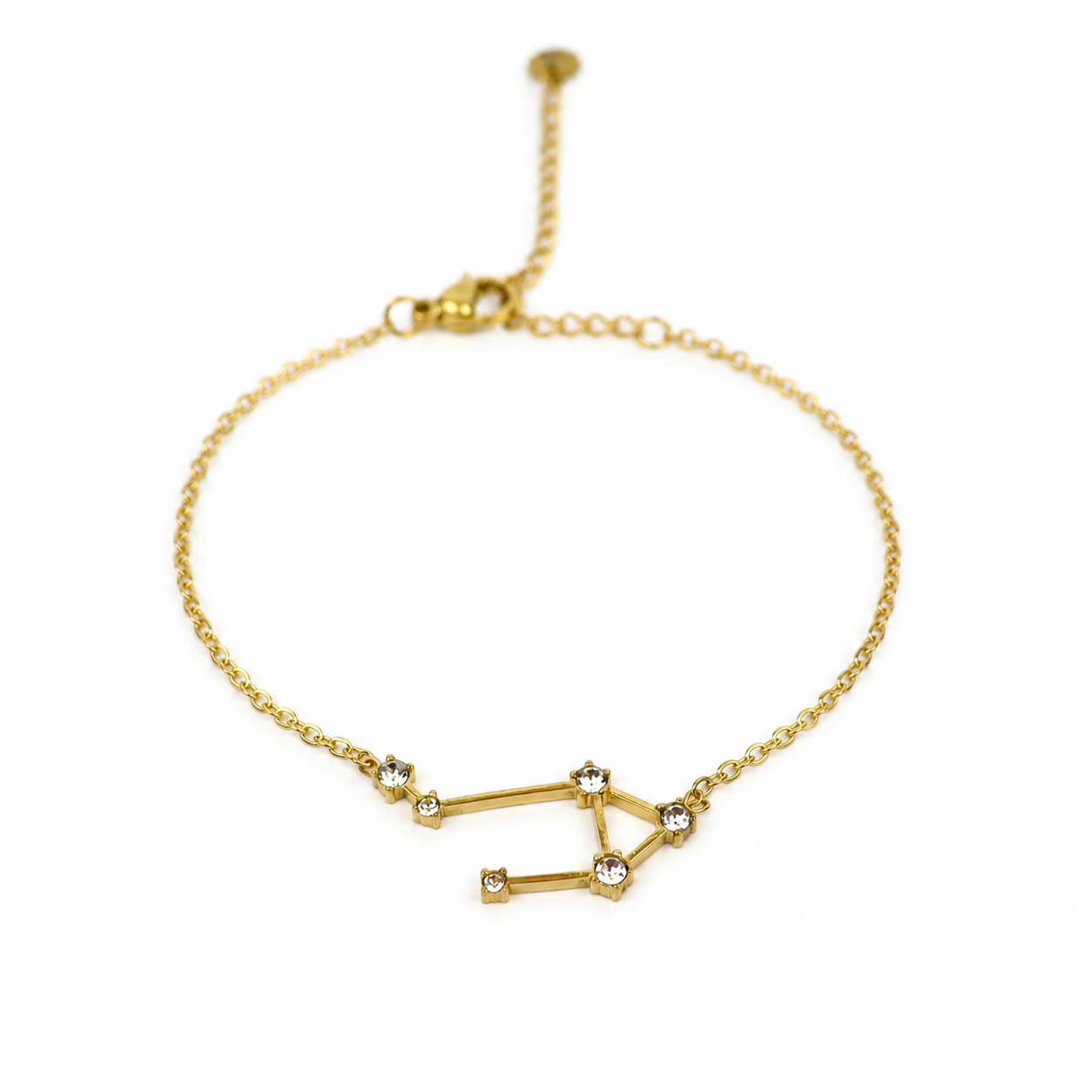 Armband van goldplated stainless steel met zirkonia steentjes in de vorm van het sterrenbeeld weegschaal